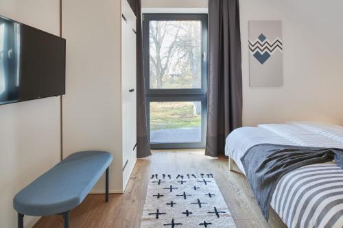 Postel nebo postele na pokoji v ubytování Ferienhaus Backsteinquartier B Putbus