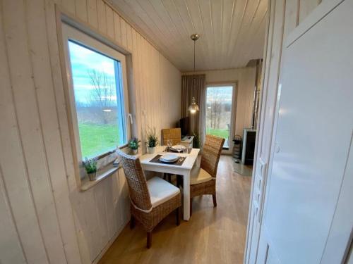 Et opholdsområde på Ferienhaus Skipper Hus by Seeblick Ferien ORO, Kamin,Sauna