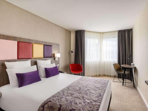 Postel nebo postele na pokoji v ubytování Mercure Budapest Korona