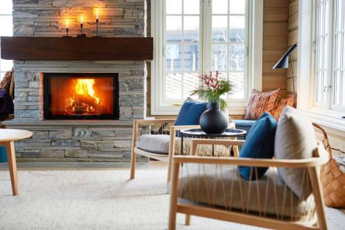 Χώρος καθιστικού στο Spacious cabin with panoramic view, bbq, Wifi & fireplace