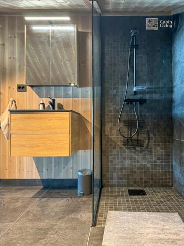 Ένα μπάνιο στο New modern cabin at Norefjell with sauna