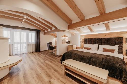 Postel nebo postele na pokoji v ubytování Freina Mountain Lifestyle Hotel