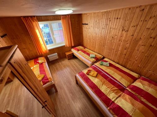 an overhead view of a room with two beds at Penzion pod Vlekem Dolní Morava in Dolní Morava