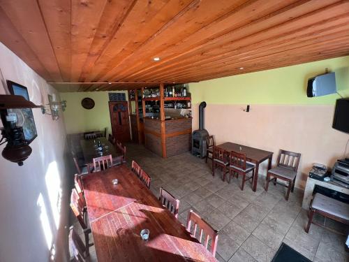 an overhead view of a restaurant with tables and chairs at Penzion pod Vlekem Dolní Morava in Dolní Morava