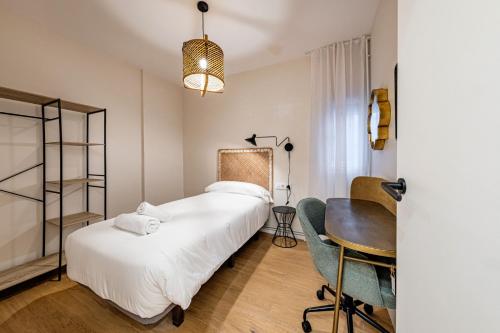 Postel nebo postele na pokoji v ubytování BeBarceloner Eixample Apartments - 4 bedrooms
