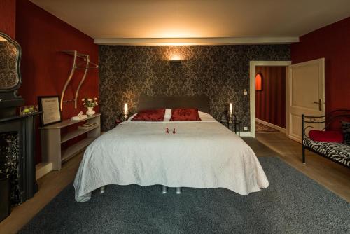 Postel nebo postele na pokoji v ubytování B&B Next Door