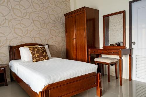 Ένα ή περισσότερα κρεβάτια σε δωμάτιο στο Alisa Krabi Hotel-SHA Plus