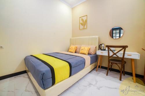 Postel nebo postele na pokoji v ubytování Riad de Alba Syariah by MHM