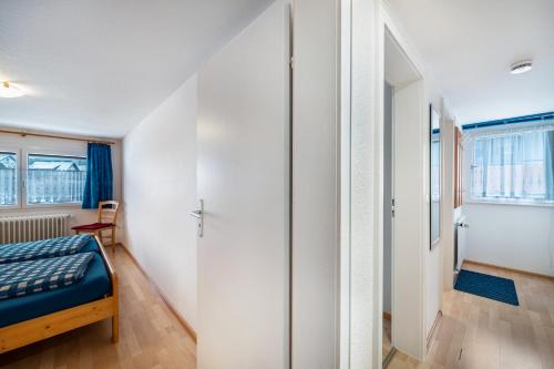 Ένα ή περισσότερα κρεβάτια σε δωμάτιο στο Haus Schöneck