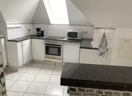 Dapur atau dapur kecil di Nice Apartment in Troisdorf