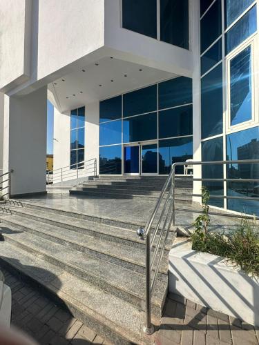 a building with stairs in front of a building at فندق نسمات in Al Madinah