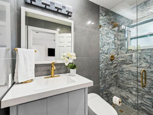 Et badeværelse på Villa wpool games BBQ