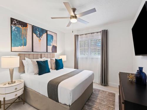 En eller flere senge i et værelse på Villa wpool games BBQ