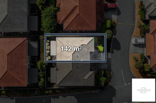 an overhead view of a building with the number at Serenity Stay Brisbane in North Lakes