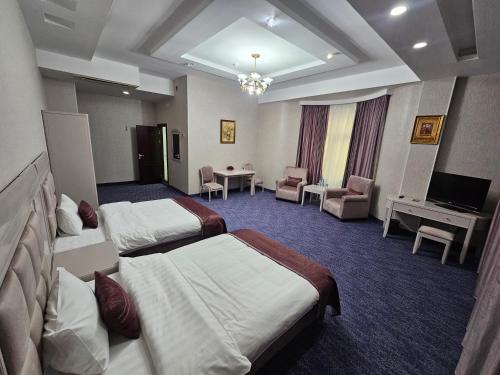 Кровать или кровати в номере Safran Hotel