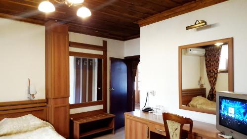 Postel nebo postele na pokoji v ubytování Chakarova Guest House