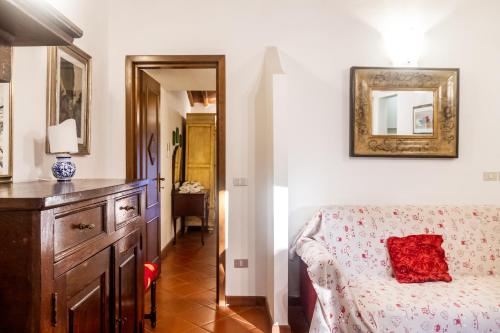Ένα ή περισσότερα κρεβάτια σε δωμάτιο στο Agriturismo Bio Fattoria Casetta
