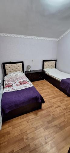 Кровать или кровати в номере Gihon Royal Villas Dilijan