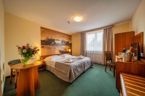 Posteľ alebo postele v izbe v ubytovaní Hotel City SM Business & Spa