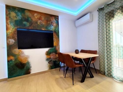 Μια τηλεόραση ή/και κέντρο ψυχαγωγίας στο Real 8 Luxury free WiFi