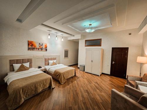 Кровать или кровати в номере Safran Hotel