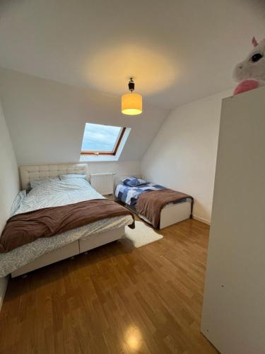 Postel nebo postele na pokoji v ubytování Gîte Belle étoile