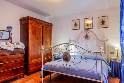 Ένα ή περισσότερα κρεβάτια σε δωμάτιο στο Agriturismo Bio Fattoria Casetta