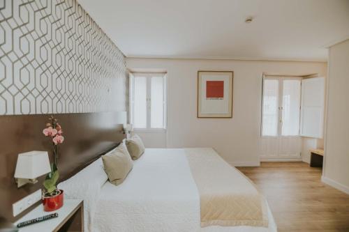 Hotel Arropeにあるベッド