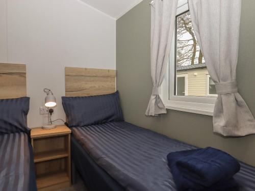 Ένα ή περισσότερα κρεβάτια σε δωμάτιο στο 6 Manor Park