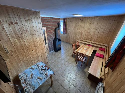 an overhead view of a room with a table and a guitar at Penzion pod Vlekem Dolní Morava in Dolní Morava