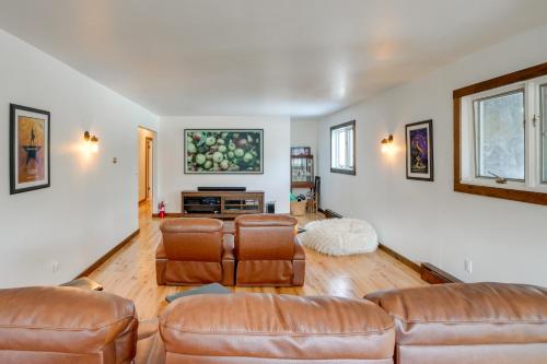 a living room with leather couches and a tv at 3 Mi to Colgate Lake Mtn-View Home, Deck and Grill! in East Jewett