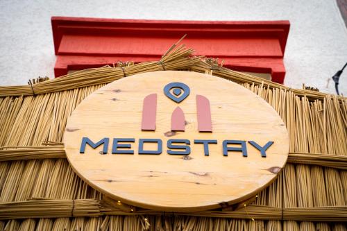 a sign on top of a mexican restaurant at Med Stay Apartment with amazing Terrace - A2 in Tamraght Ouzdar