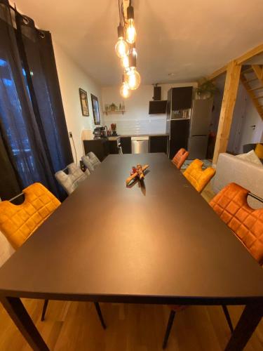 a table with a bow on it in a living room at Valley Balcony in Enveitg