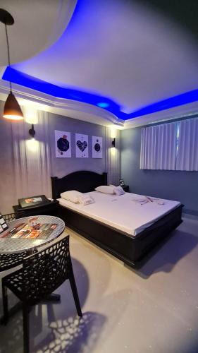 Ένα ή περισσότερα κρεβάτια σε δωμάτιο στο Top´s Motel (Adult Only)
