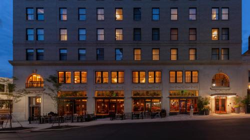 a large building with a lot of windows at The Flat Iron Hotel in Asheville