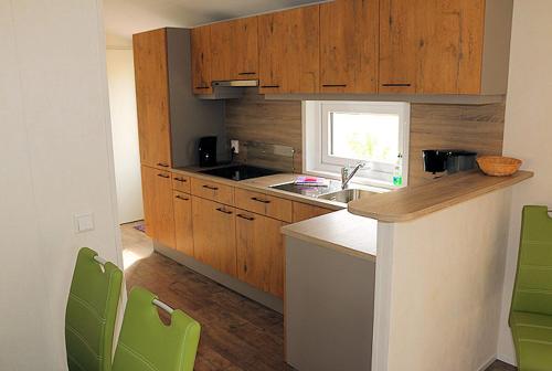 Dapur atau dapur kecil di Ferien-& Erlebnispark Plötzky