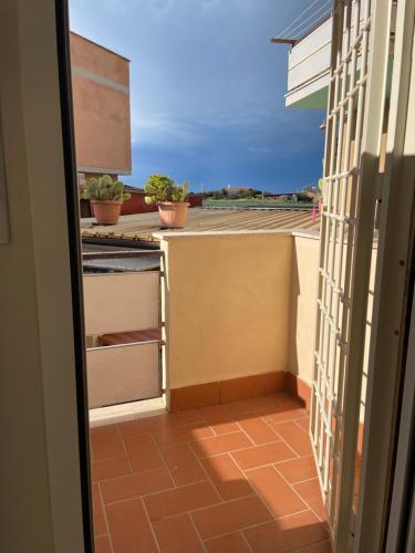 a view of a kitchen from a balcony at Alloggio fronte mare Melodia delle Onde in Ladispoli