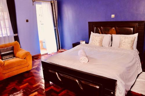 Кровать или кровати в номере Orchard Manor