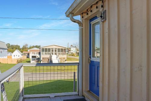 a balcony with a view of a house at Off The Hook by Pristine Properties Vacation Rentals in Saint Joe Beach