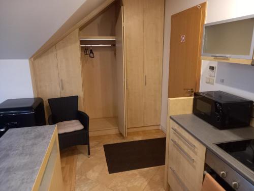 Apartmán Centrumにあるキッチンまたは簡易キッチン