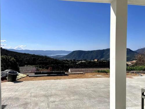 a view of the mountains from the roof of a house at Casamea - Rez de Villa, Famille, Vue mer, Clim2 in Appietto
