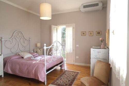 Posteľ alebo postele v izbe v ubytovaní B&B Orsobigio