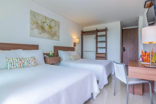 Postel nebo postele na pokoji v ubytování Hotel Soleira
