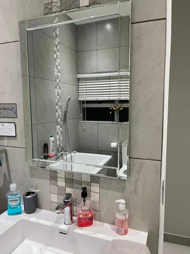 Ein Badezimmer in der Unterkunft Utopia Guest House