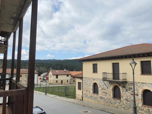 a view of a town from a house at La Casona de Navaleno in Navaleno