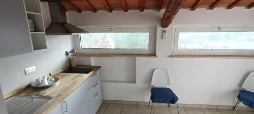 Η κουζίνα ή μικρή κουζίνα στο Bambù Affittacamere & Residence