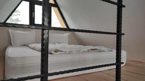 Letto o letti in una camera di MOTEL PRISLOP