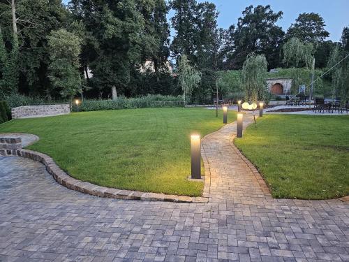 a park with lights in the middle of a field at Parkhotel Senftenberg in Senftenberg