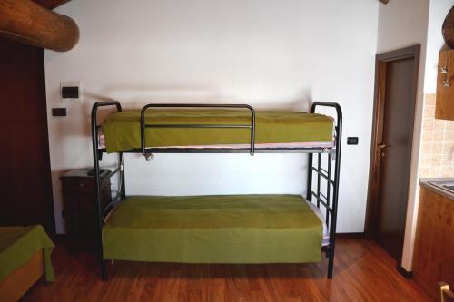 a couple of bunk beds in a room at Ca 'd Borla in Usseglio