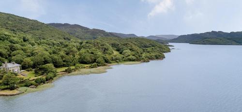 an island in the middle of a river at Magnificent Country House with Swimming Pool in Barmouth